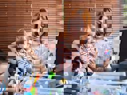 Mother looking after two children