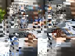 Laptop open to show a video conference