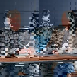 two people discussing finances